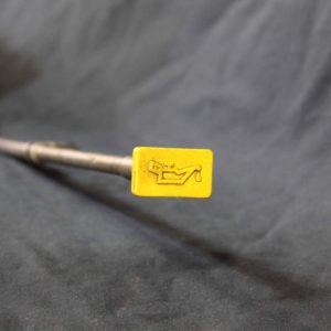 Dip stick and tube engine oil